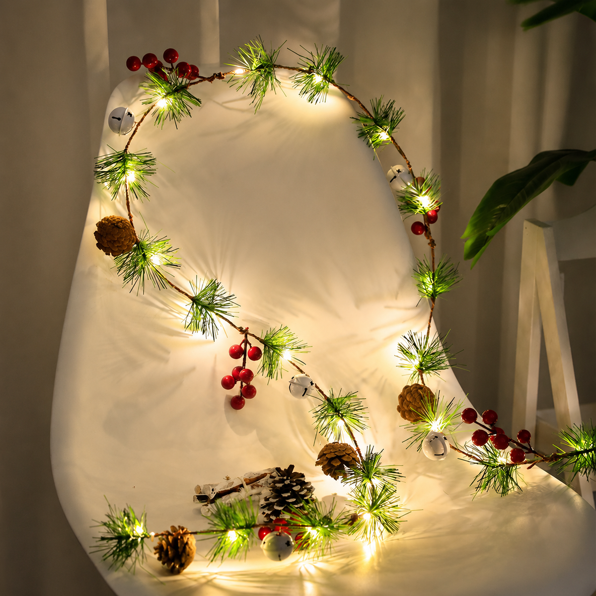 Berry pine garland warm white lights chair